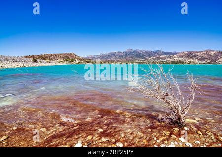 Bramian Lake in Ierapetra, Crete, Greece. The artificial Bramian Lake was built in 1986 to cover the cultivation needs of 30,000 acres of Ierapetra. T Stock Photo