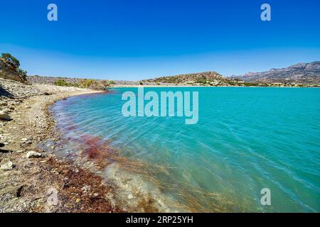 Bramian Lake in Ierapetra, Crete, Greece. The artificial Bramian Lake was built in 1986 to cover the cultivation needs of 30,000 acres of Ierapetra. T Stock Photo