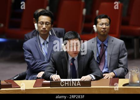 (180824) -- UNITED NATIONS, Aug. 24, 2018 -- Wu Haitao (Front), China s deputy permanent representative to the United Nations, addresses a Security Council meeting at the UN headquarters in New York, Aug. 23, 2018. Wu Haitao on Thursday called for international consensus in the fight against terrorism. ) (zxj) UN-SECURITY COUNCIL-CHINESE ENVOY-TERRORISM LixMuzi PUBLICATIONxNOTxINxCHN Stock Photo