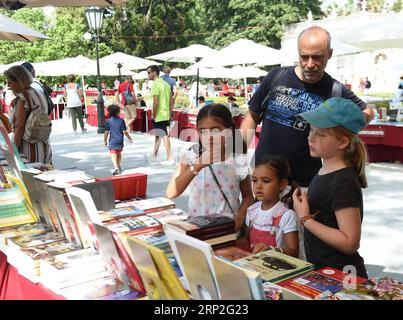 (180903) -- LISBON, Sept. 3, 2018 -- People visit the 3rd Belem book fair in Belem Palace in Lisbon, Portugal, on Sept. 2, 2018. The 4-day book fair ended on Sept. 2. ) (jmmn) PORTUGAL-LISBON-BOOK FAIR ZhangxLiyun PUBLICATIONxNOTxINxCHN Stock Photo
