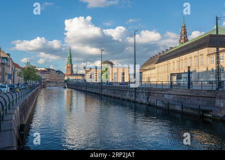 Copenhagen Canal Skyline and Slotsholmen with Nikolaj Kunsthal Tower - Copenhagen, Denmark Stock Photo