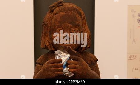 Sculpture of a girl made of chocolate, chocolate museum, Modica, baroque city, baroque angle, southeast, Sicily, Italy Stock Photo