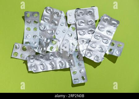 Empty tablet blister pack against a monochrome background, top view Stock Photo