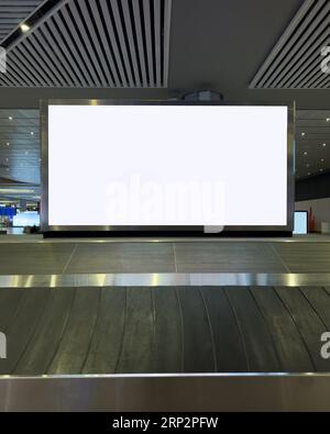 Advertising board in the airport luggage area Stock Photo