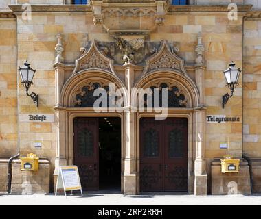 Historic portal of the post office in the city centre of Magdeburg, Saxony-Anhalt, Germany Stock Photo