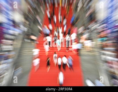 (180916) -- BEIJING, Sept. 16, 2018 -- People visit the 15th China-ASEAN Expo in Nanning, south China s Guangxi Zhuang Autonomous Region, Sept. 15, 2018. )(mcg) XINHUA PHOTO WEEKLY CHOICES HuangxXiaobang PUBLICATIONxNOTxINxCHN Stock Photo