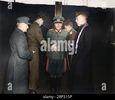 German General Anton Dostler is tied to a stake before his execution by a firing squad in the Aversa stockade. The General was convicted and sentenced Stock Photo