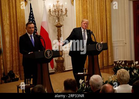 (180919) -- WASHINGTON D.C., Sept. 19, 2018 -- U.S. President Donald Trump (R) and visiting Polish President Andrzej Duda attend a joint press conference at the White House in Washington D.C. Sept. 18, 2018. Donald Trump said on Tuesday that the U.S. was weighing the idea of establishing a permanent military base in Poland, a proposal raised by the visiting Polish leader. ) (jmmn) U.S.-WASHINGTON D.C.-POLAND S PRESIDENT-VISIT TingxShen PUBLICATIONxNOTxINxCHN Stock Photo