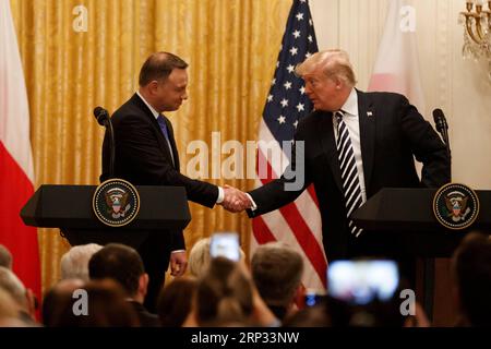 (180919) -- WASHINGTON D.C., Sept. 19, 2018 -- U.S. President Donald Trump (R) and visiting Polish President Andrzej Duda attend a joint press conference at the White House in Washington D.C. Sept. 18, 2018. Donald Trump said on Tuesday that the U.S. was weighing the idea of establishing a permanent military base in Poland, a proposal raised by the visiting Polish leader. ) (jmmn) U.S.-WASHINGTON D.C.-POLAND S PRESIDENT-VISIT TingxShen PUBLICATIONxNOTxINxCHN Stock Photo