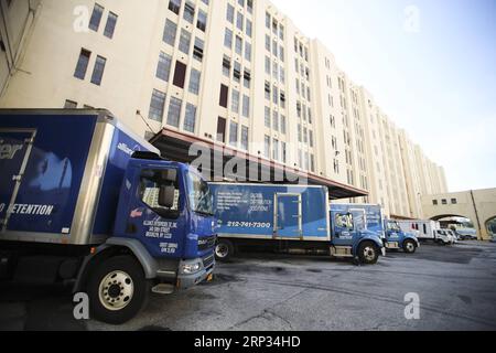 (180919) -- NEW YORK, Sept. 19, 2018 -- Trucks wait to upload and download goods in Brooklyn Army Terminal in New York, the United States, on Sept. 19, 2018. The U.S. federal government began to build the Brooklyn Army Terminal in May 1918 as a military depot and supply base. New York City purchased it in 1981 with the intention of repurposing the structure for manufacturing and industrial use. The space is home to nearly 4,000 jobs across 100 businesses nowadays, accommodating thriving small businesses in New York City. ) U.S.-NEW YORK-BROOKLYN ARMY TERMINAL-SMALL BUSINESSES WangxYing PUBLICA Stock Photo