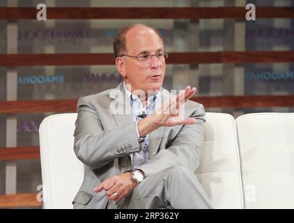 180921 -- NEW YORK, Sept. 21, 2018 -- Larry Fink, CEO of BlackRock, speaks during Yahoo Finance All Markets Summit in New York, the United States, Sept. 20, 2018. The U.S. economy stands to be hurt in the long term by the imposition of unilateral tariffs on its major trading partners including Mexico, Canada and China as the punitive measures are always the last resort in dealing with trade disputes, business leaders said. TO GO WITH Spotlight: Business leaders say U.S. to be hurt in long term by unilateral tariffs  yk U.S.-NEW YORK-ECONOMY-SUMMIT WangxYing PUBLICATIONxNOTxINxCHN Stock Photo