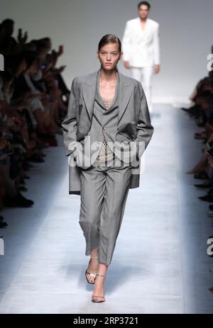 (180922) -- MILAN, Sept. 22, 2018 () -- A model presents a creation of the Ermanno Scervino during Milan Fashion Week Spring/Summer 2019 in Milan, Italy, on Sept. 22, 2018. () ITALY-MILAN-FASHION WEEK Xinhua PUBLICATIONxNOTxINxCHN Stock Photo