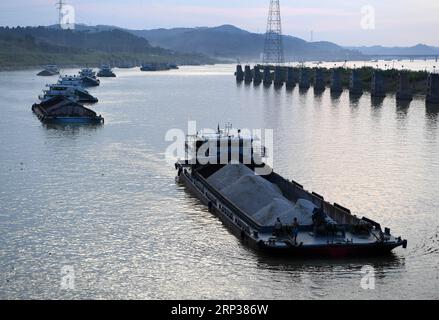 (180924) -- NANNING, Sept. 24, 2018 -- Cargo vessels pass the ship lock at the Changzhou reservoir, a water conservancy project on the Xijiang River, in Wuzhou, south China s Guangxi Zhuang Autonomous Region, Sept. 21, 2018. Xijiang River is an important trade route in southwest China. ) (zyd) CHINA-GUANGXI-WATER CHANNEL (CN) ZhouxHua PUBLICATIONxNOTxINxCHN Stock Photo