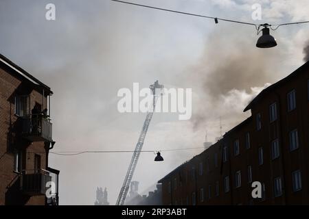 A suspected detonation has occurred in an apartment building in Norrköping early on Sunday morning. A fire has spread to the attic and caused the roof to collapse. At least 150 people are said to have been evacuated from their homes. Stock Photo