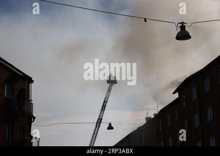 A suspected detonation has occurred in an apartment building in Norrköping early on Sunday morning. A fire has spread to the attic and caused the roof to collapse. At least 150 people are said to have been evacuated from their homes. Stock Photo