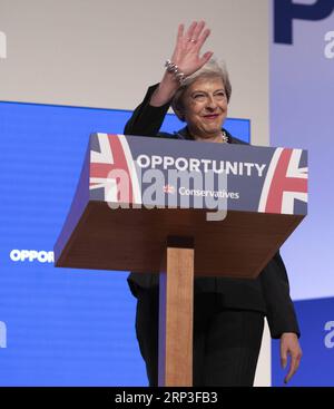 (181003) -- BIRMINGHAM, Oct. 3, 2018 -- Britain s Prime Minister Theresa May gives a speech during the Conservative Party annual conference 2018 in Birmingham, Britain on Oct. 3, 2018. British Prime Minister Theresa May on Wednesday ruled out the possibility of a second Brexit referendum, saying the second referendum would be a politicians vote. )(dh) BRITAIN-BIRMINGHAM-CONSERVATIVES PARTY CONFERENCE-PRIME MINISTER HanxYan PUBLICATIONxNOTxINxCHN Stock Photo