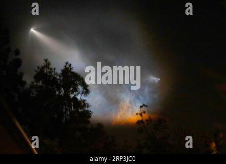 (181008) -- LOS ANGELES, Oct. 8, 2018 -- A SpaceX Falcon 9 rocket lights up the sky over Los Angeles, California, the United States, Oct. 7, 2018. U.S. private spaceflight company SpaceX launched an Argentine Earth-observing satellite on a Falcon 9 rocket from Vandenberg Air Force Base in California on Sunday. ) (jmmn) U.S.-LOS ANGELES-SPACEX LixYing PUBLICATIONxNOTxINxCHN Stock Photo