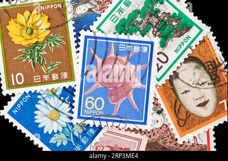 Madrid, Spain; 08-13-2023: Postage stamp printed in Japan with a triumphant star turban (Guildfordia triumphans), sea shell from circa 1988 with more Stock Photo