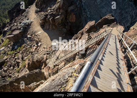 Most of the 180 stairs that provide access to the Sierra Buttes fire lookout in Sierra County California.  The tower was built in 1915 but these sturd Stock Photo