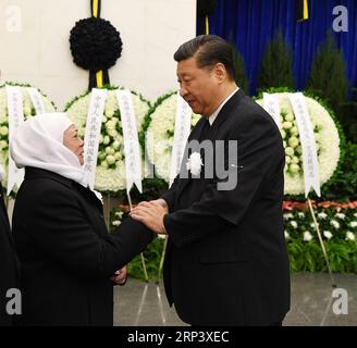 (181018) -- BEIJING, Oct. 18, 2018 -- Chinese President Xi Jinping (R) extends condolence to the family of the late Ismail Amat, vice chairperson of the Standing Committee of the 10th National People s Congress, at the Babaoshan Revolutionary Cemetery in Beijing, capital of China, Oct. 18, 2018. The funeral of Ismail Amat was held Thursday in Beijing. Ismail Amat, also vice chairperson of the 7th National Committee of the Chinese People s Political Consultative Conference and former state councilor, passed away due to illness at the age of 84 in Beijing on Oct. 16. Xi Jinping, Li Zhanshu, Wang Stock Photo