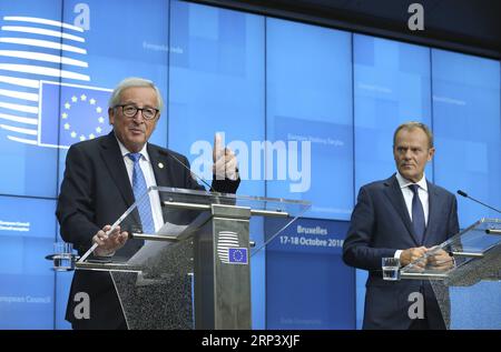 (181018) -- BRUSSELS, Oct. 18, 2018 -- European Commission President Jean-Claude Juncker (L) and European Council President Donald Tusk attend a press conference after the EU summit on Oct. 18, 2018, in Brussels, capital of Belgium. ) (lrz) BELGIUM-BRUSSELS-EU-SUMMIT YexPingfan PUBLICATIONxNOTxINxCHN Stock Photo