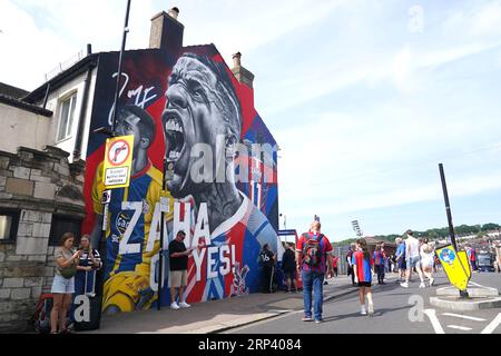 A mural of former player Wilfried Zaha outside the stadium ahead of the Premier League match at Selhurst Park, London. Picture date: Sunday September 3, 2023. Stock Photo