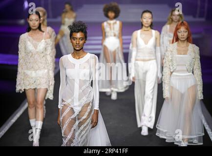 (181022) -- BEIJING, Oct. 22, 2018 -- Models present creations of brand AIMER during a fashion show in Beijing, capital of China, Oct. 21, 2018. ) (yxb) CHINA-BEIJING-FASHION SHOW(CN) CaixYang PUBLICATIONxNOTxINxCHN Stock Photo