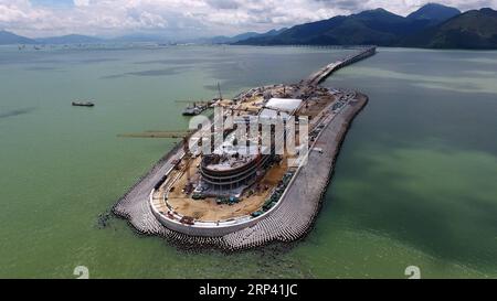 (181022) -- ZHUHAI, Oct. 22, 2018 -- Aerial photo taken on July 4, 2017 shows the construction site of the Hong Kong-Zhuhai-Macao Bridge in the Lingdingyang waters, south China. The Hong Kong-Zhuhai-Macao Bridge is to be officially open to traffic at 9 a.m. on Oct. 24. The 55-kilometer-long bridge, situated in the Lingdingyang waters of the Pearl River Estuary, will be the world s longest sea bridge. The construction began on Dec. 15, 2009. It will slash the travel time between Hong Kong and Zhuhai from three hours to just 30 minutes, further integrating the cities in the Pearl River Delta. ) Stock Photo