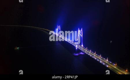 (181022) -- ZHUHAI, Oct. 22, 2018 -- Photo taken on Dec. 30, 2017 shows the construction site of the Hong Kong-Zhuhai-Macao Bridge in the Lingdingyang waters, south China. The Hong Kong-Zhuhai-Macao Bridge is to be officially open to traffic at 9 a.m. on Oct. 24. The 55-kilometer-long bridge, situated in the Lingdingyang waters of the Pearl River Estuary, will be the world s longest sea bridge. The construction began on Dec. 15, 2009. It will slash the travel time between Hong Kong and Zhuhai from three hours to just 30 minutes, further integrating the cities in the Pearl River Delta. ) (zyd) Stock Photo