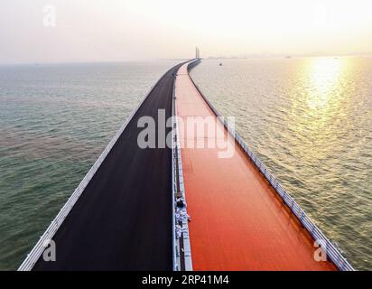 (181022) -- ZHUHAI, Oct. 22, 2018 -- Photo taken on April 29, 2017 shows the bridge floor of the Hong Kong-Zhuhai-Macao Bridge under construction in the Lingdingyang waters, south China. The Hong Kong-Zhuhai-Macao Bridge is to be officially open to traffic at 9 a.m. on Oct. 24. The 55-kilometer-long bridge, situated in the Lingdingyang waters of the Pearl River Estuary, will be the world s longest sea bridge. The construction began on Dec. 15, 2009. It will slash the travel time between Hong Kong and Zhuhai from three hours to just 30 minutes, further integrating the cities in the Pearl River Stock Photo