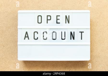 Lightbox with word open account on wood background Stock Photo