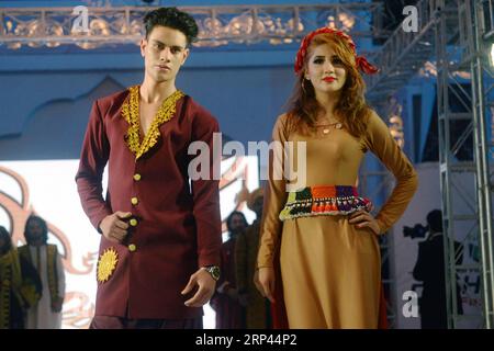(181026) -- PESHAWAR, Oct. 26, 2018 -- Models present creations by Afghani designer Omaid Rasul during Pak-Afghan fashion show in northwest Pakistan s Peshawar on Oct. 25, 2018. ) (zxj) PAKISTAN-PESHAWAR-PAK-AFGHAN-FASHION SHOW UmarxQayyum PUBLICATIONxNOTxINxCHN Stock Photo