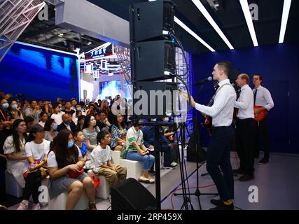 Beijing, China. 3rd Sep, 2023. Singers perform at the exhibition zone of Britain at the China National Convention Center during the 2023 China International Fair for Trade in Services (CIFTIS) in Beijing, capital of China, Sept. 3, 2023. Britain is the guest country of honor of the 2023 CIFTIS. Themed 'Opening-up leads development, cooperation delivers the future,' the 2023 CIFTIS is being held in Beijing from Sept. 2 to 6. Credit: Sun Weitong/Xinhua/Alamy Live News Stock Photo