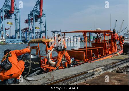 (181029) -- JAKARTA, Oct. 29, 2018 -- The speed boat carrying debris of passenger jet and body of victims arrives at the Tanjung Priok port, Jakarta, Indonesia, Oct. 29, 2018. A passenger plane of Indonesia s Lion Air with 189 people aboard crashed into the sea off Karawang of Indonesia s West Java province shortly after taking off from Jakarta Monday, head of the national Search and Rescue Office M. Syaugi said. ) (psw) INDONESIA-JAKARTA-LION AIR-CRASH VerixSanovri PUBLICATIONxNOTxINxCHN Stock Photo