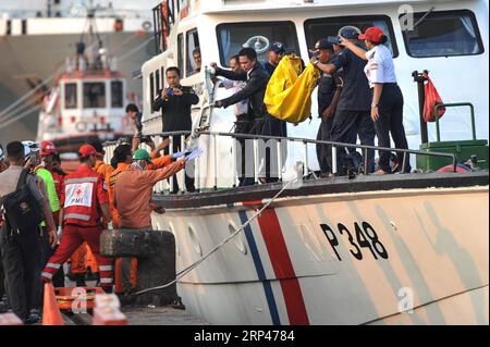 (181029) -- JAKARTA, Oct. 29, 2018 -- Search and Rescue officers move the body bags containing victims of the Lion Air JT610 that crashed into the sea off Karawang of West Java province at the joint base of Search and Rescue at the Tanjung Priok Port, Jakarta, Oct. 29, 2018. Indonesia s national Search and Rescue Agency said on Monday that all the 189 people onboard a Lion Air plane that crashed into the sea off western Indonesia may have died. ) (lrz) INDONESIA-JAKARTA-LION AIR-CRASH VerixSanovri PUBLICATIONxNOTxINxCHN Stock Photo