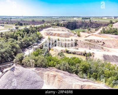 Open pit view of a quartzite rock quarry in Sioux Falls, South Dakota Stock Photo