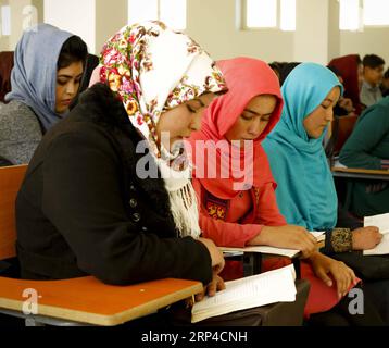 (181104) -- BAMIYAN, Nov. 4, 2018 -- University students attend a class at Bamiyan University in Bamiyan province, central Afghanistan, Nov. 4, 2018. Established around two decades ago, but shut down by the Taliban outfit in 1997, after the armed outfit overran Bamiyan province, Bamiyan University was reopened in 2003 and since then has been serving as the main higher educational center in the highland region of Afghanistan. TO GO WITH Feature: More girls enroll in university in Afghanistan s Bamiyan province, post-grad job situation remains tight )(psw) AFGHANISTAN-BAMIYAN-GIRLS-EDUCATION Noo Stock Photo