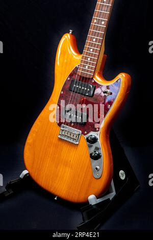 Fender Mustang 90 short scale electric guitar on black