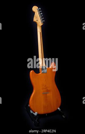 Fender Mustang 90 short scale electric guitar on black