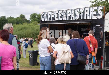 The second Gardeners World Autumn Fair at Audley End House and Gardens, Saffron Walden, Essex. Queue for coffee and cake at the show. Stock Photo