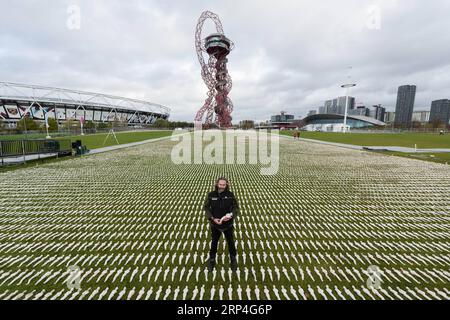 (181107) -- LONDON, Nov. 7, 2018 -- Artist Rob Heard poses for photos with his installation Shrouds of the Somme at the Queen Elizabeth Olympic Park in London, Britain, on Nov. 7, 2018. Shrouds of the Somme is an art installation representing 72,396 British Commonwealth servicemen killed at the Battle of the Somme who have no known grave to mark 100 years since the end of the First World War. ) BRITAIN-LONDON-INSTALLATION-SHROUDS OF THE SOMME RayxTang PUBLICATIONxNOTxINxCHN Stock Photo