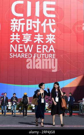 (181110) -- SHANGHAI, Nov. 10, 2018 -- Staff members walk at the venue of the first China International Import Expo(CIIE) in Shanghai, east China, Nov. 10. 2018. The CIIE concluded here on Saturday. )(wsw) (IMPORT EXPO)CHINA-SHANGHAI-CIIE-CONCLUSION (CN) LixHe PUBLICATIONxNOTxINxCHN Stock Photo