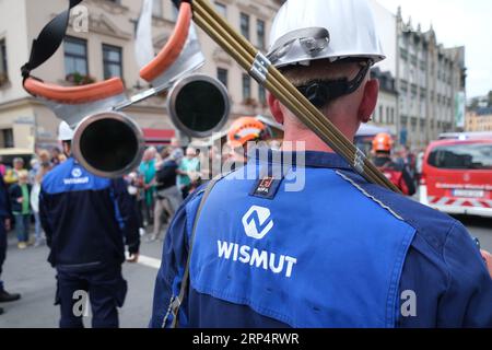 Aue Bad Schlema, Germany. 03rd Sep, 2023. Employees of the post-mining company Wismut walk through the city center during the Saxony Day parade. Saxony's largest folk and local festival traditionally takes place on the first weekend in September. Credit: Sebastian Willnow/dpa/Alamy Live News Stock Photo