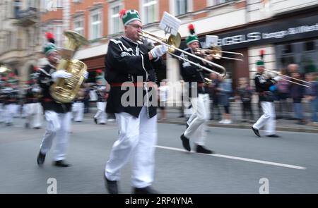 Aue Bad Schlema, Germany. 03rd Sep, 2023. Representatives of mining and miners' associations walk through the city center during the Saxon Day parade. Saxony's largest folk and local festival traditionally takes place on the first weekend in September. Credit: Sebastian Willnow/dpa/Alamy Live News Stock Photo