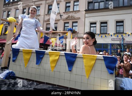 Aue Bad Schlema, Germany. 03rd Sep, 2023. Participants of the parade on a float to the bath tradition of the region at the Day of Saxony. Saxony's largest folk and local festival traditionally takes place on the first weekend in September. Credit: Sebastian Willnow/dpa/Alamy Live News Stock Photo