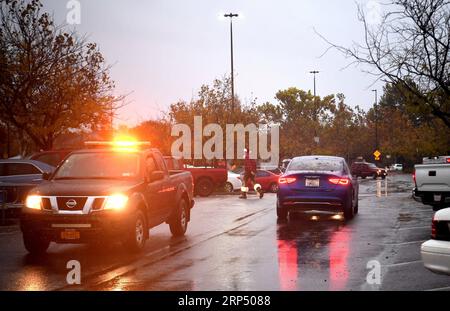 (181122) -- BUTTE, Nov. 22, 2018 (Xinhua) -- Cars move in the rain at a parking lot in Chico of Butte County, California, the United States, Nov. 21, 2018. Local officials warned that the rain after the wildfire could cause risk of flash floods and mudflows. (Xinhua/Wu Xiaoling)(clq) U.S.-CALIFORNIA-BUTTE-WILDFIRE-RAIN PUBLICATIONxNOTxINxCHN Stock Photo