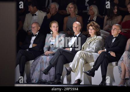 Sophia Loren, 81, makes statement at Giorgio Armani show in Milan