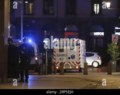 (181211) -- STRASBOURG (FRANCE), Dec. 11, 2018 -- Policemen stand guard in the center of Strasbourg, France, on Dec. 11, 2018. At least two people were killed and eleven wounded in a shooting near a Christmas market in the French city of Strasbourg on Tuesday evening, local media reported. ) FRANCE-STRASBOURG-SHOOTING YexPingfan PUBLICATIONxNOTxINxCHN Stock Photo