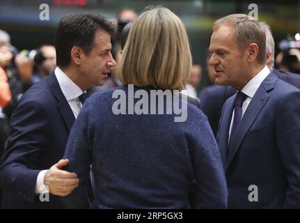 (181214) -- BRUSSELS, Dec. 14, 2018 -- Italian Prime Minister Giuseppe Conte, EU High Representative for Foreign Affairs and Security Policy Federica Mogherini and European Council President Donald Tusk (from L to R) talk during the second day of an EU summit in Brussels, Belgium, Dec. 14, 2018. ) BELGIUM-BRUSSELS-EU-SUMMIT YexPingfan PUBLICATIONxNOTxINxCHN Stock Photo