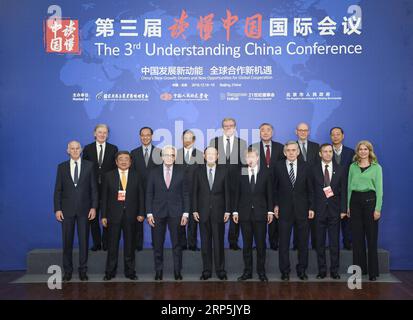 (181217) -- BEIJING, Dec. 17, 2018 -- Yang Jiechi (4th L, front), a member of the Political Bureau of the Communist Party of China (CPC) Central Committee and director of the Office of the Foreign Affairs Commission of the CPC Central Committee, poses for a group photo with delegates to the 3rd Understanding China Conference before the opening ceremony of the conference in Beijing, capital of China, Dec. 16, 2018. President Xi Jinping sent a congratulatory letter to the 3rd Understanding China Conference which opened in Beijing on Sunday. ) CHINA-BEIJING-YANG JIECHI-UNDERSTANDING CHINA CONFERE Stock Photo